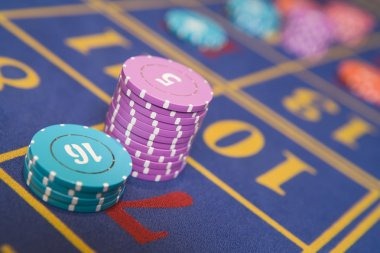 Red Tiger live-dealer studio with HD camera setup and professional dealer at table